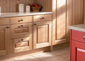 Kitchen in light oak and red