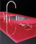 Raspberry coloured glass worktop